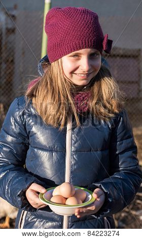 Pretty Girl Holding  Organic Eggs