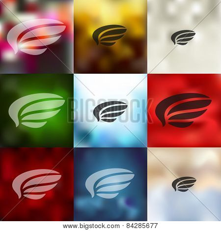 wing icon on blurred background