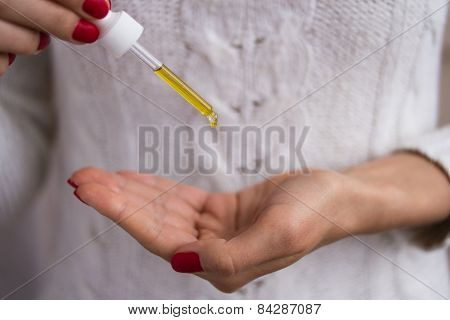 Hands To Apply The Serum