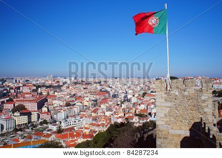 Lisbon spring skyline with Portugal flag