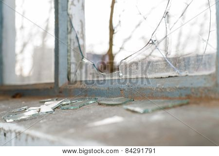 Broken Glass At Window Of Old Industrial Building