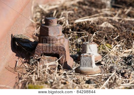 Old And Lost Railroadtrack With Nut And Bolt