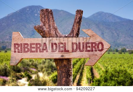 Ribera Del Duero wooden sign with vineyard background