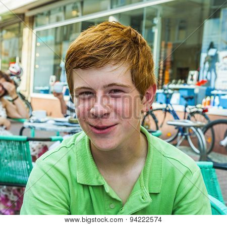 Boy With Red Hair Is Looking Happy And Friendly