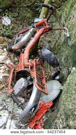 Red Moped Inoperative Abandoned In
