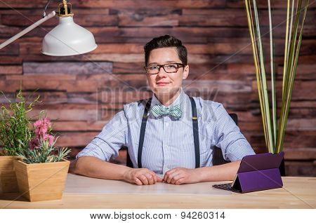 Dapper Woman In Hipster Office With Tablet