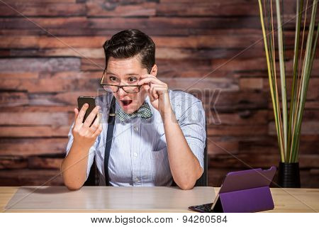 Businesswoman Looking Over Eyeglasses