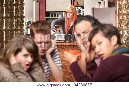 Worker Turning Up Loud Music