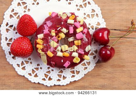 sweet doughnut on wooden table