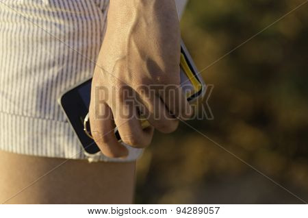Close Up Hand Holding A Phone.