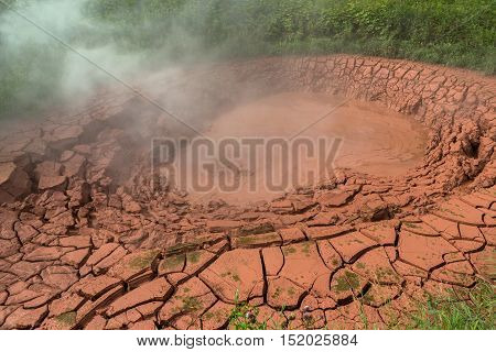 Krasnyy Red Mudpot in Valley of Geysers. Kronotsky Nature Reserve on Kamchatka Peninsula.