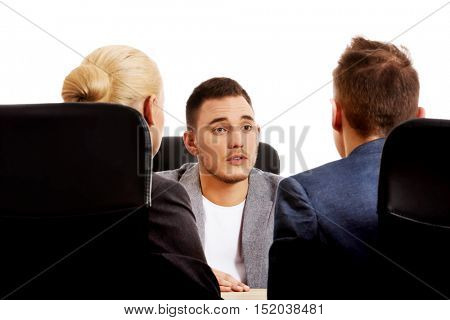 Business meeting-three people sitting and talking