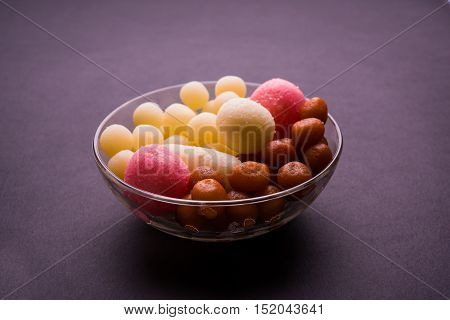 Bangladesh or kolkata's or India's favourite sweet rasgulla, chamcham and gulab jamun, dry rasgulla, bengal sweets, made of milk / khoya, sweet meets, extreme closeup