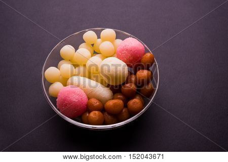 Bangladesh or kolkata's or India's favourite sweet rasgulla, chamcham and gulab jamun, dry rasgulla, bengal sweets, made of milk / khoya, sweet meets, extreme closeup