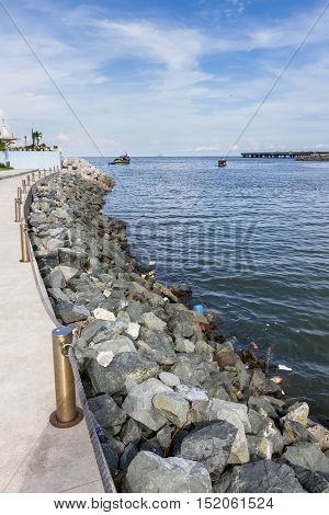 Panama City Panama- June 08: trash floating on a protected cove viewed form the Urraca Park in Panama. June 08 2016 Panama City Panama.