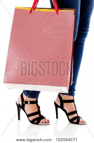 Woman with a lot of shopping bags