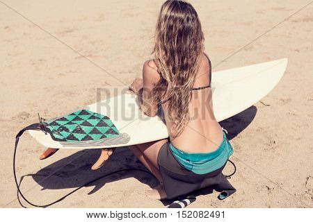 surfergirl is wating for the perfect wave