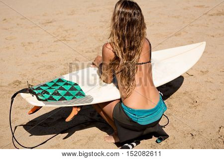 surfergirl is wating for the perfect wave