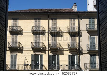 Como (Lombardy Italy): facade of hitoric palace seen from the interior of the cathedral