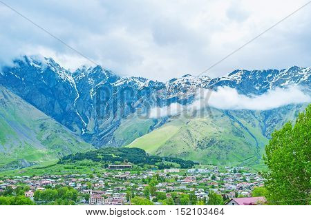 The view on the Stepantsminda mountain resort from the of Kazbegi National Park Georgia.