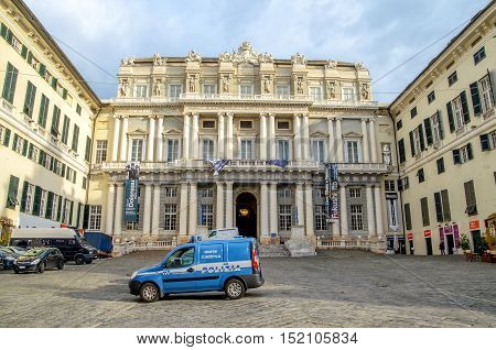 Genoa Italy December 2 2013: police car parked in front of the Palazzo Ducale of Genova.