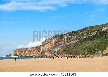 Main Beach In Nazare, A Surfing Paradise Town