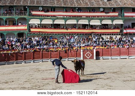 Chinchon SPAIN - October 15 2016: Spainish bullfighter El Fundi with the cape in the main square of chinchon during the festival benefit traditional Chinchon Madrid province Spain