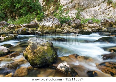 In the mountains of Abkhazia. The flow of water in a mountain river Yupshara.