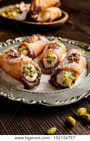 Traditional Sicilian Cannoli Stuffed With Ricotta And Pistachios