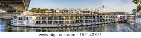 COLOGNE GERMANY - SEP 21 2016: skyline of Cologne with river Rhine in late afternoon and cruise ship
