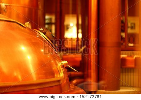 Copper red beer tank with a handle and a lid
