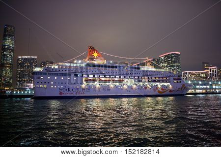 HONG KONG  - 26 JANUARY, 2016: view of Kowloon from a Star Ferry at night. Kowloon is an urban area in Hong Kong comprising the Kowloon Peninsula and New Kowloon.