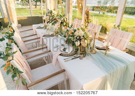 beautifully decorated table with flowers for wedding party