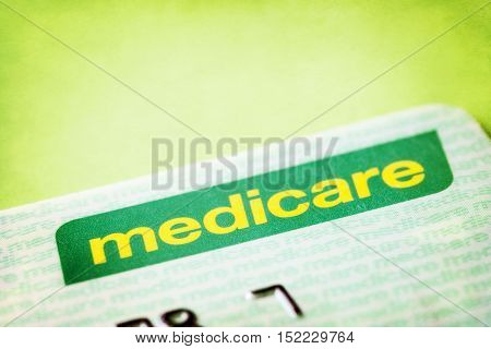 Australian Medicare card over textured background.
