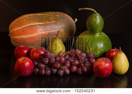 fruits on a dark background, studio picture