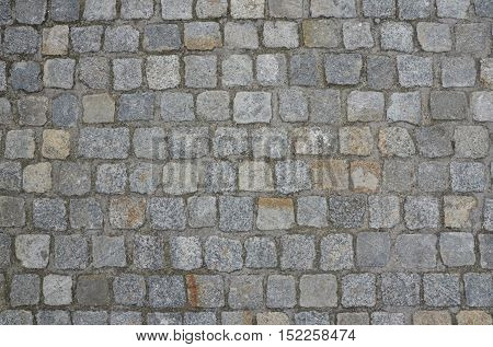 Old outdoor building stone wall. Rustic background.