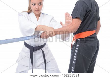 Young athlete exercising with a partner in self-defense.