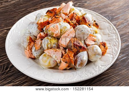 Salmon and young potato warm salad with a lemony yogurt dressing.