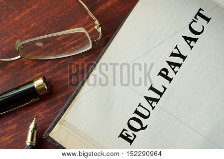 Equal Pay Act of 1963 written on a page.