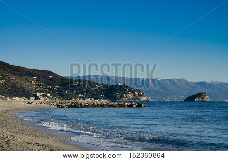 fishermen's arrival on the coast at dawn after a night of fishing with the sun kissing the sea