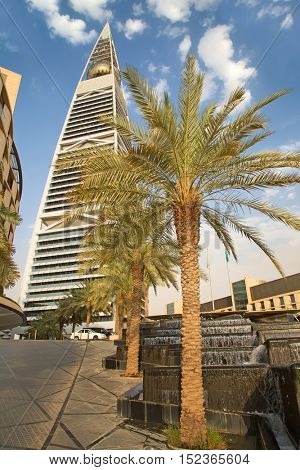 RIYADH - AUGUST 22: Sunset light at Al Faisaliah tower facade on August 22, 2016 in Riyadh, Saudi Arabia. Al Faisaliah towers is a luxury hotel and the most distinctive skyscraper in Saudi Arabia
