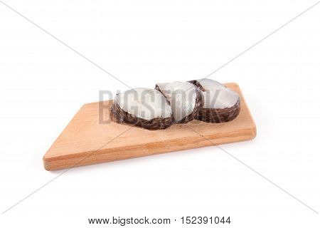 Marine fish on the kitchen board isolated on white background