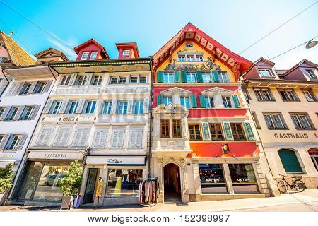 Zug, Switzerland - June 28, 2016: Colorful buildings on the center of Zug town near Zurich city in Switzerland
