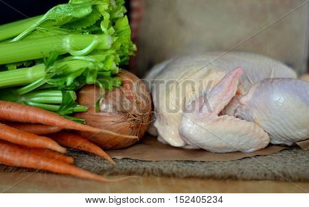 Ingredients for Making Chicken Soup. Bag of rice shown in background.