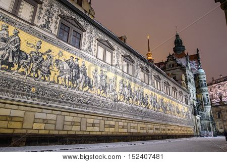 Dresden's Old Town at night in winter, a fresco on the wall