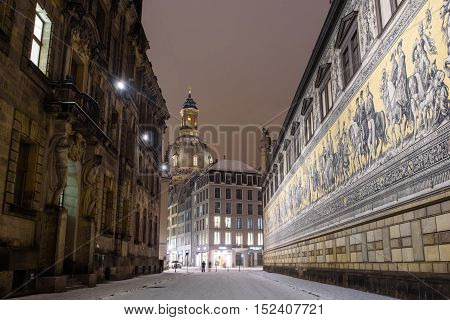 Dresden's Old Town at night in winter, a fresco on the wall