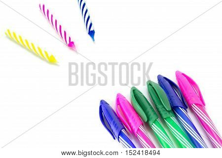 Happy birthday candle and Colorful pen on white background