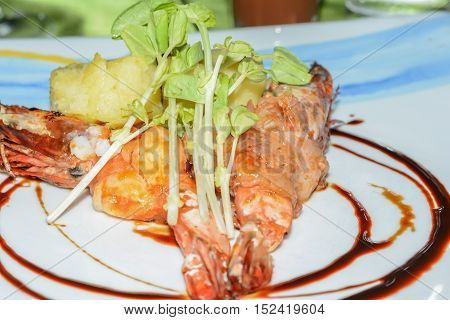 A grilled tiger shrimp prawns on plate