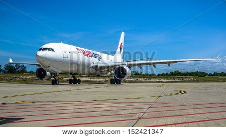 Labuan,Malaysia-Oct 19,2016:MASkargo Airbus A330-200F aircraft id 9M-MUA is rolling for takeoff on runway at Labuan Airport on 19th Oct 2016.MASkargo is the premier air cargo carrier based in Malaysia