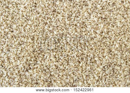 Parboiled rice spread out and filled in as background
